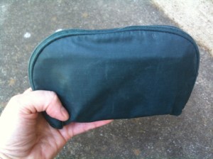 A small travel makeup kit.