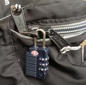 The zippers are locked to the security ring.  They aren't going to move.