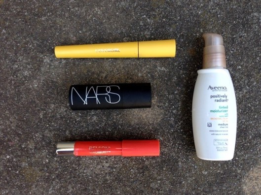 Easy summer makeup - CoverGirl mascara, NARS makeup stick for eyes and cheeks, Revlon balm stain stick for lips, with a base of SPF 30 tinted moisturizer from Aveeno. Decant the moisturizer into a 1-1/2 oz bottle to save space in your liquids bag. Add in some eye shadow and maybe another stain stick for the evening and you're good to go!