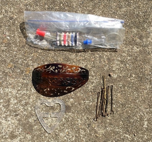 Contents of the middle pocket of the Sea to Summit toiletry kit